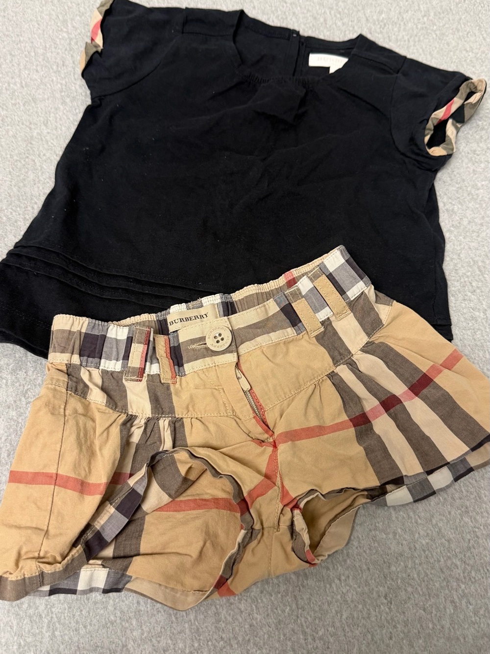 Burberry Black Top with Tan Plaid Shorts